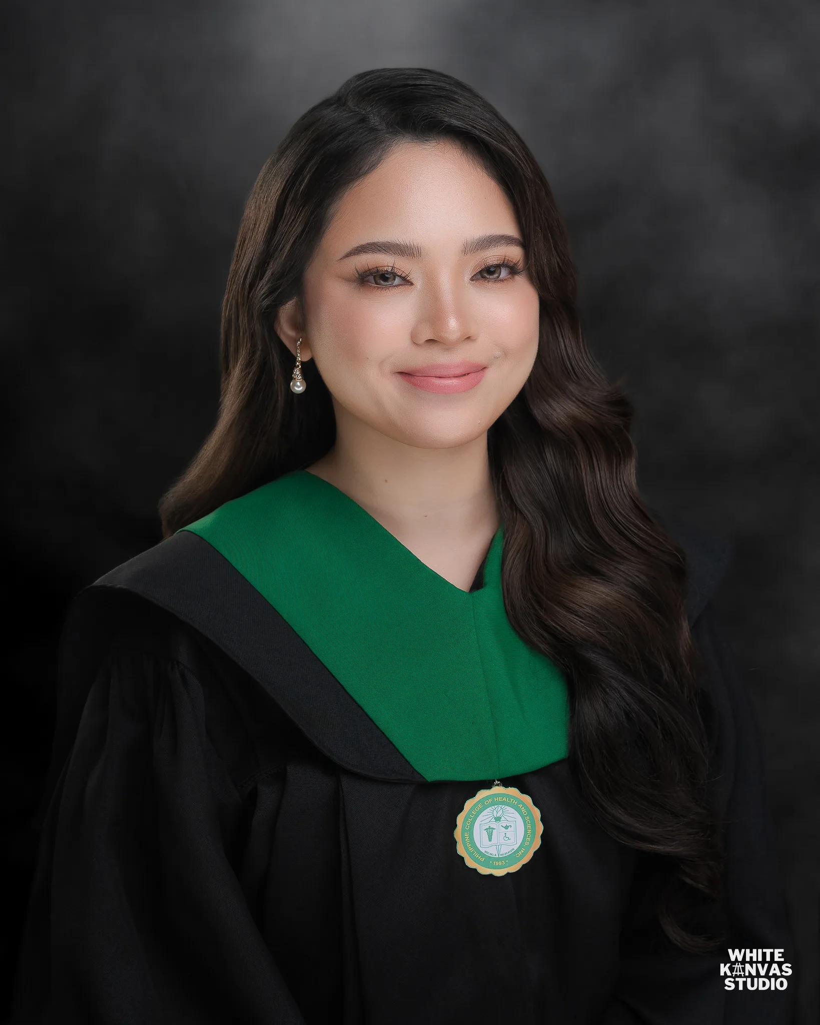 Graduation portrait — White Kanvas Studio signature service
